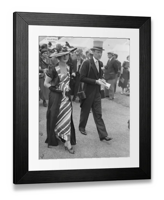 Framed Print : Rainbow fashion at Ascot. Photo shows: Mrs W. J. Connell wearing dazzling rainbow