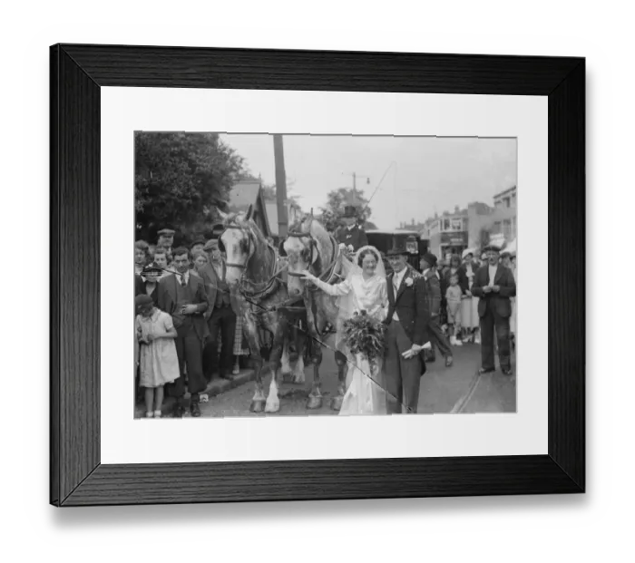 Framed Print : An old fashion wedding at Eltham Parish church. The bride and groom stand next to the horse Framed Print : An old fashion wedding at Eltham Parish church. The bride and groom stand next to the horse
