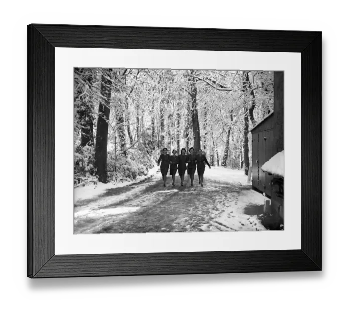 Framed Print : ATS girls leaving their headquarters in Hastings, Sussex today found their surroundings