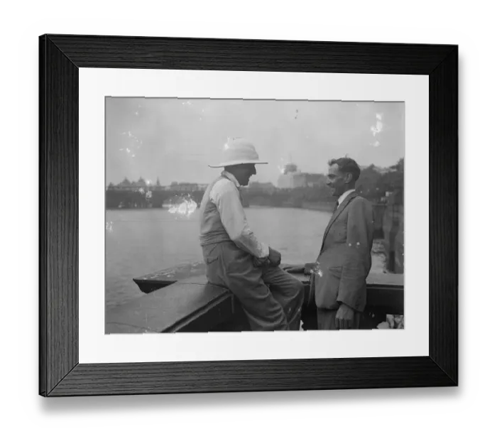 Framed Print : Pith Helmets on the embankment. A visitor to London was seen wearing a pith helmet Framed Print : Pith Helmets on the embankment. A visitor to London was seen wearing a pith helmet