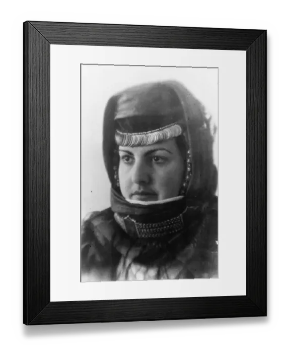 Framed Print : The beauty of the East. Beautifully modelled face framed in the heavy swathing Framed Print : The beauty of the East. Beautifully modelled face framed in the heavy swathing