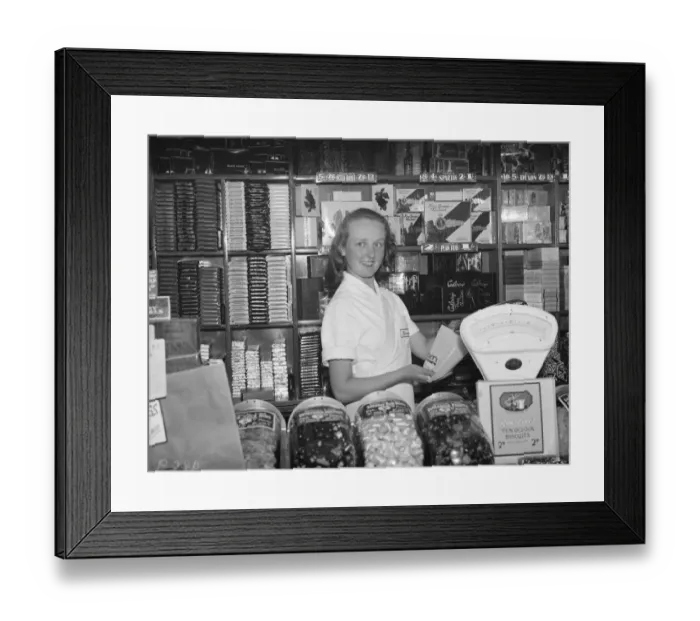 Framed Print : Sidcups beauty queen winner, Miss Jennie Boyles at work in the sweet shop. 1938 Framed Print : Sidcups beauty queen winner, Miss Jennie Boyles at work in the sweet shop. 1938