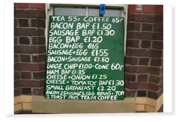 Print : Handwritten breakfast menu on a board outside a cafe, Rhyl, Denbighshire, North Wales Print : Handwritten breakfast menu on a board outside a cafe, Rhyl, Denbighshire, North Wales