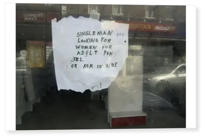 Print : Hand-written notice stuck prominently on display in an empty High Street shop window