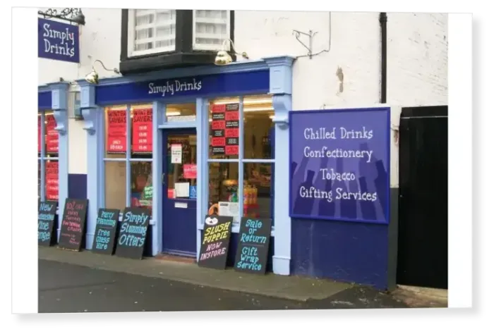 Print : Eye-catching off-licence called Simply Drinks with blackboards and posters advertising Print : Eye-catching off-licence called Simply Drinks with blackboards and posters advertising