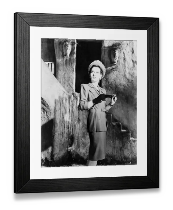 Framed Print : Brown and white gingham shirt and matching Timmins on a pert halo hat make effective Framed Print : Brown and white gingham shirt and matching Timmins on a pert halo hat make effective