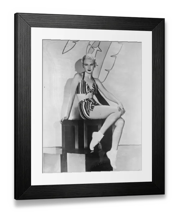 Framed Print : For the 1934 bathing girl. June Vlasek, the Hollywood screen actress, displaying Framed Print : For the 1934 bathing girl. June Vlasek, the Hollywood screen actress, displaying