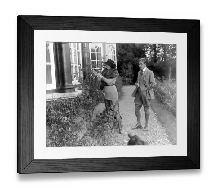 Framed Print : Constance, Duchess of Westminsterand Captain Lewis in the garden of her New Forest Framed Print : Constance, Duchess of Westminsterand Captain Lewis in the garden of her New Forest