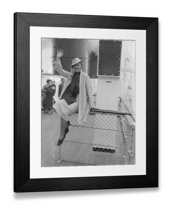 Framed Print : Cora Goffin, the well - known British comedy actress, waves to the camera onboard ship Framed Print : Cora Goffin, the well - known British comedy actress, waves to the camera onboard ship