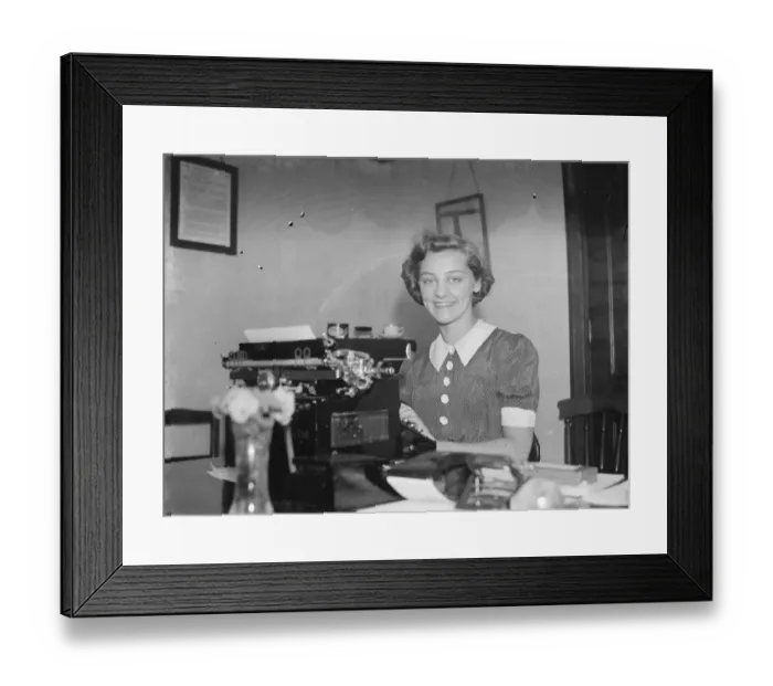 Framed Print : The Bexleyheath Gala Queen, Miss Dorothy Gardner, sitting at a typewriter. 1939