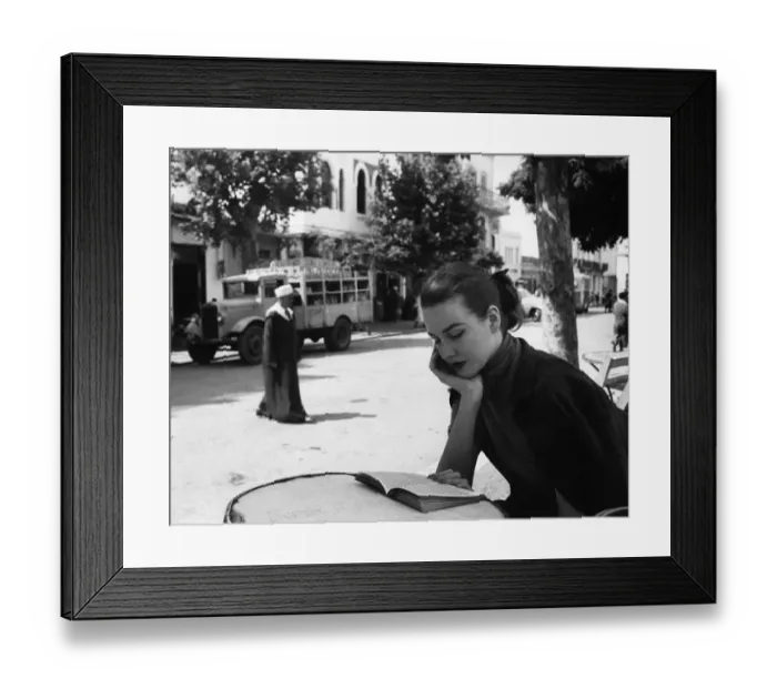 Framed Print : This may be one of the subjects of the passerbys stares since the young lady sat Framed Print : This may be one of the subjects of the passerbys stares since the young lady sat