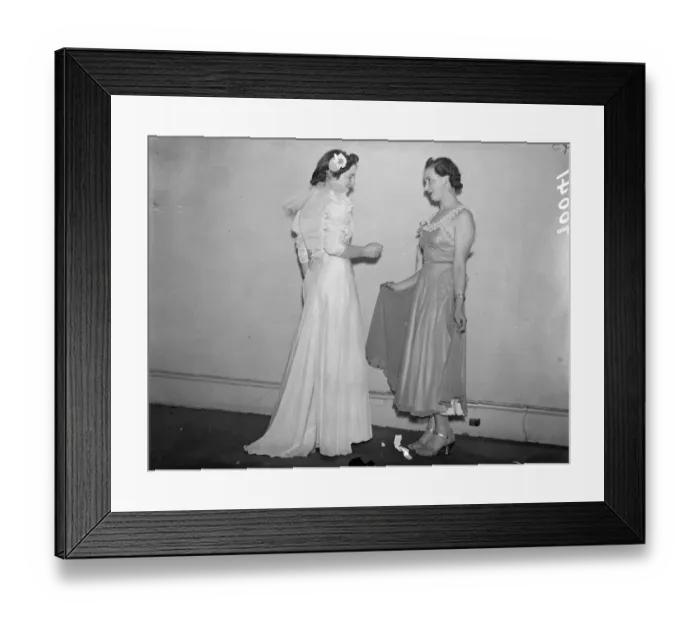 Framed Print : In the short evening dress fraction compared with a more flowing model. Exquisite gowns Framed Print : In the short evening dress fraction compared with a more flowing model. Exquisite gowns