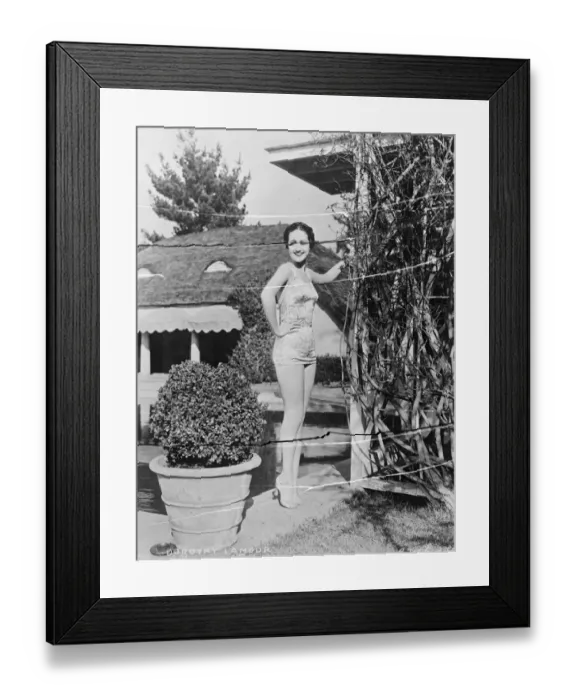 Framed Print : A dazzling new bathing creation of printed material worn by Dorothy Lamour, the Hollywood Framed Print : A dazzling new bathing creation of printed material worn by Dorothy Lamour, the Hollywood