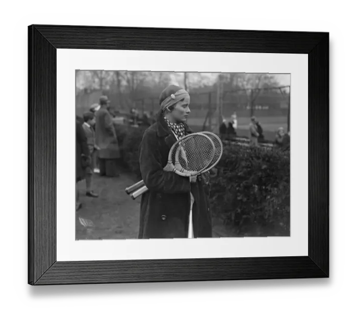 Framed Print : New fashion in tennis headwear. Miss J Mc Alpine plays with watch in bandou Framed Print : New fashion in tennis headwear. Miss J Mc Alpine plays with watch in bandou