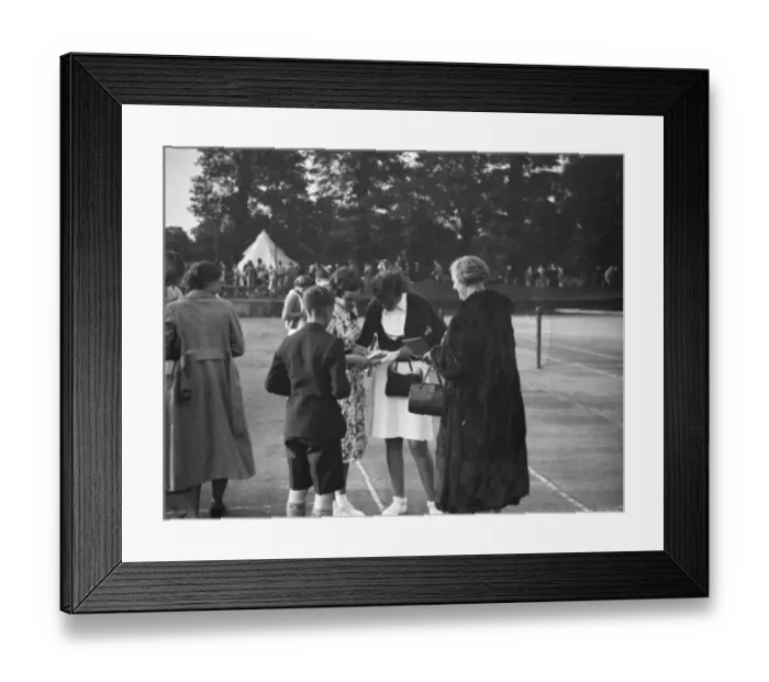 Framed Print : Miss E M Denney at the Miller Hospital lawn tennis competition signing autographs. 1938 Framed Print : Miss E M Denney at the Miller Hospital lawn tennis competition signing autographs. 1938