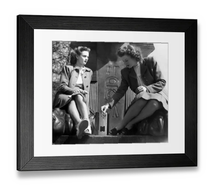 Framed Print : Two women listening to the radio. 1947