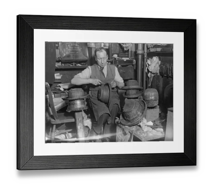 Framed Print : Making Londons queerest hats. In the steep winding alleyway which slopes into Framed Print : Making Londons queerest hats. In the steep winding alleyway which slopes into