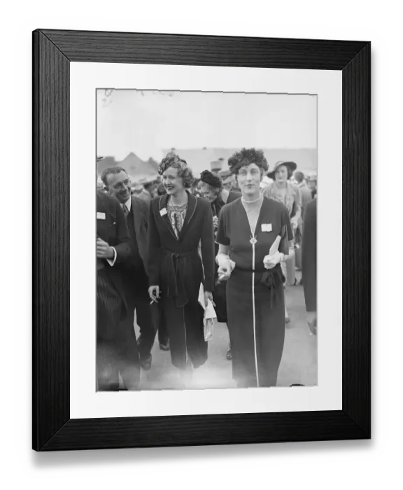 Framed Print : Hat novelties at Ascot. Two novel hat styles seen at Ascot on the opening day of