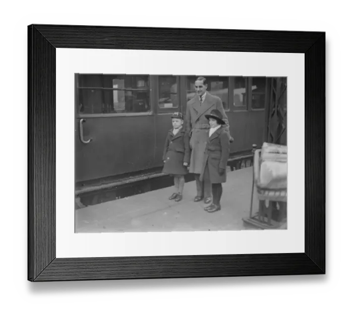 Framed Print : At Waterloo Herbert Sutcliffe with his wife and family on leaving for a Christmas cruise
