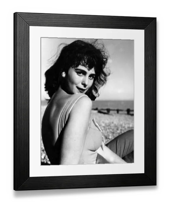 Framed Print : Monica Hibbert - A woman in the 1960s on Hastings beach in Sussex Framed Print : Monica Hibbert - A woman in the 1960s on Hastings beach in Sussex