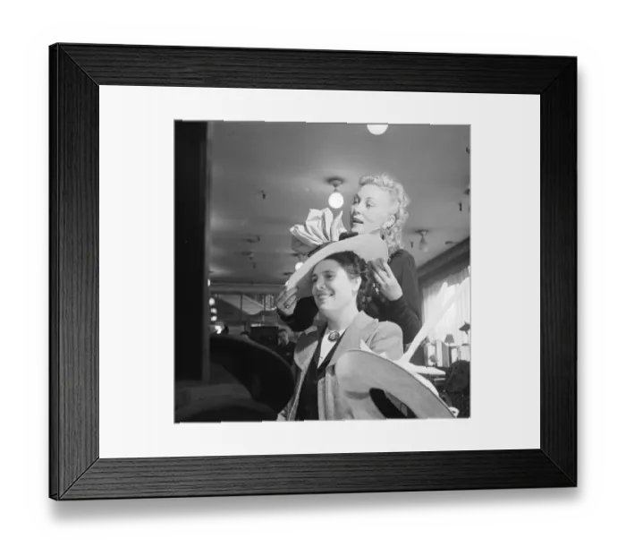 Framed Print : Day in the life of a Midinette. A Parisian salesgirl, selling hats. 1930s