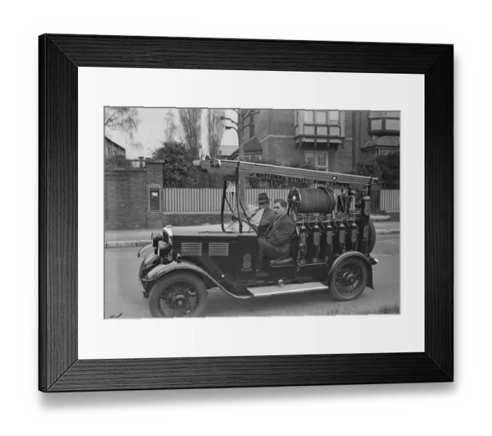 Framed Print : This fire engine invented by Richard Sansome is claimed to be the smallest fire engine