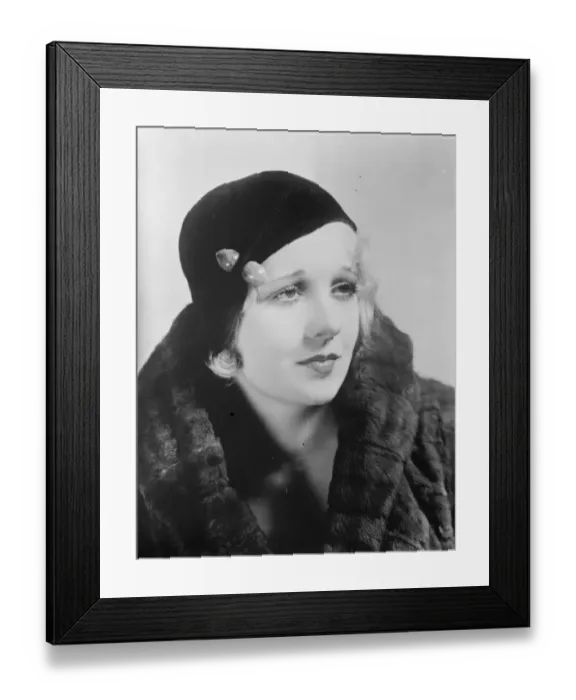 Framed Print : A charming hat thats popular this season. The brimless hat, Miss Anita Page