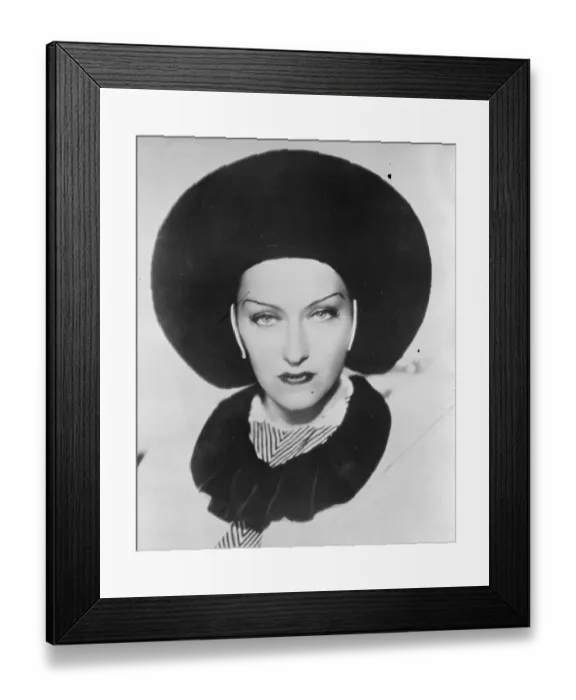 Framed Print : The Halo hat worn by Gloria Swanson, the American filmstar. 20 October 1934 Framed Print : The Halo hat worn by Gloria Swanson, the American filmstar. 20 October 1934