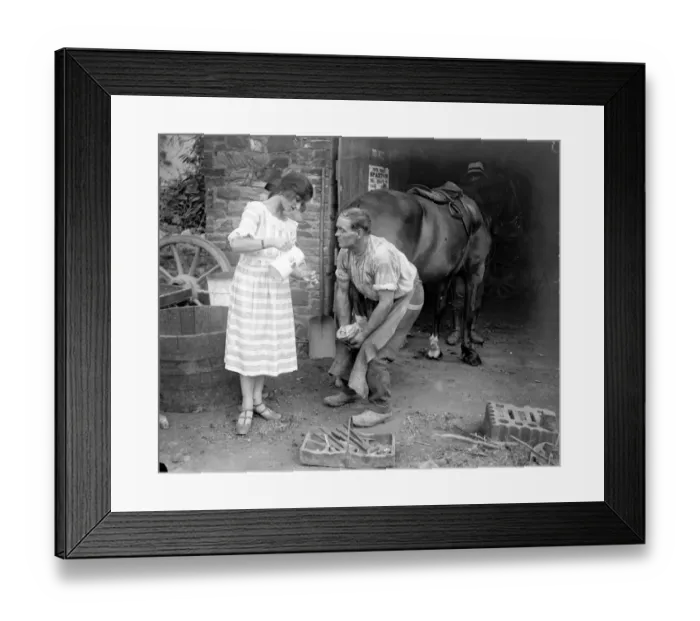 Framed Print : Miss Edna Maude, the seventeen year old dancer on holiday - giving the blacksmith Framed Print : Miss Edna Maude, the seventeen year old dancer on holiday - giving the blacksmith