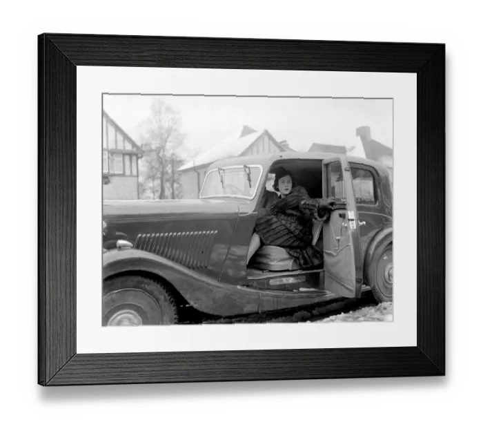 Framed Print : Miss Muriel Oxford sitting in the passenger seat of a car at the side of the road. 1937 Framed Print : Miss Muriel Oxford sitting in the passenger seat of a car at the side of the road. 1937