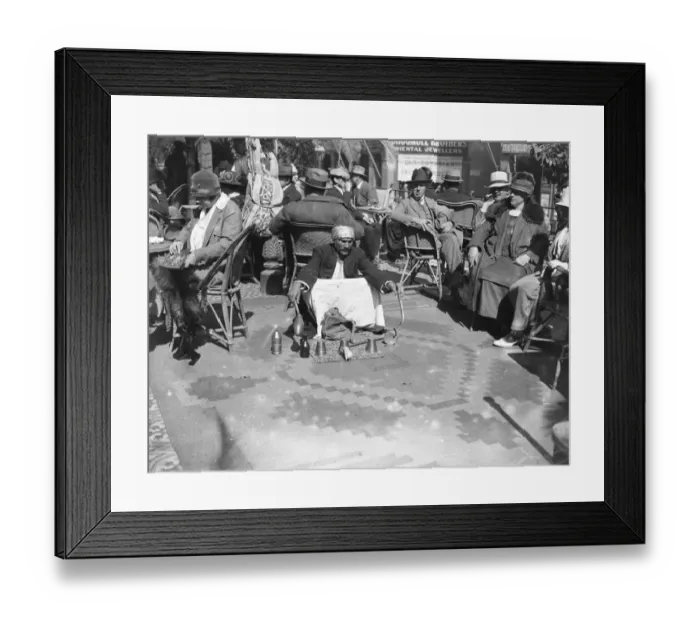 Framed Print : The Cairo Season. The native conjurer entertaining guests on the terrace Framed Print : The Cairo Season. The native conjurer entertaining guests on the terrace