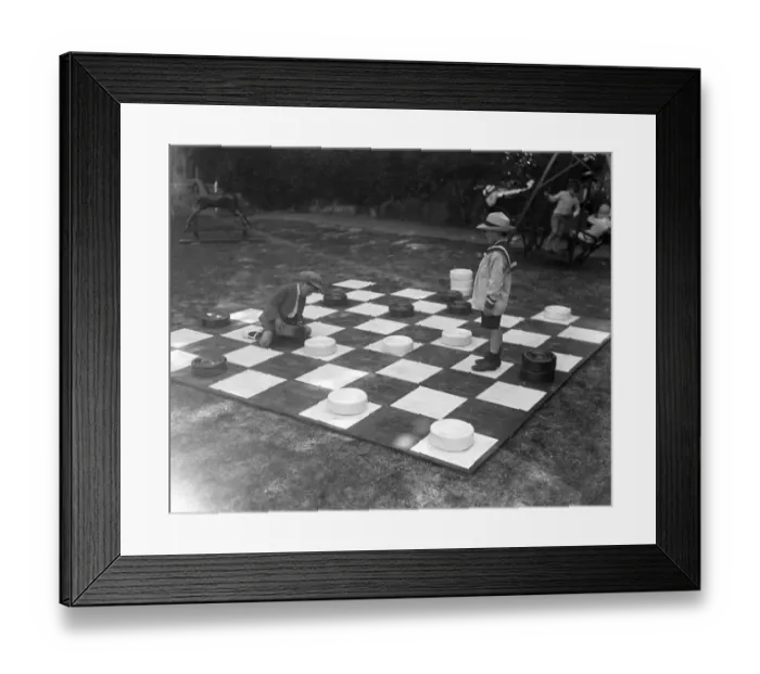 Framed Print : Children play giant draughts in Devonshire Park, Eastbourne, Sussex. 21 June 1920 Framed Print : Children play giant draughts in Devonshire Park, Eastbourne, Sussex. 21 June 1920