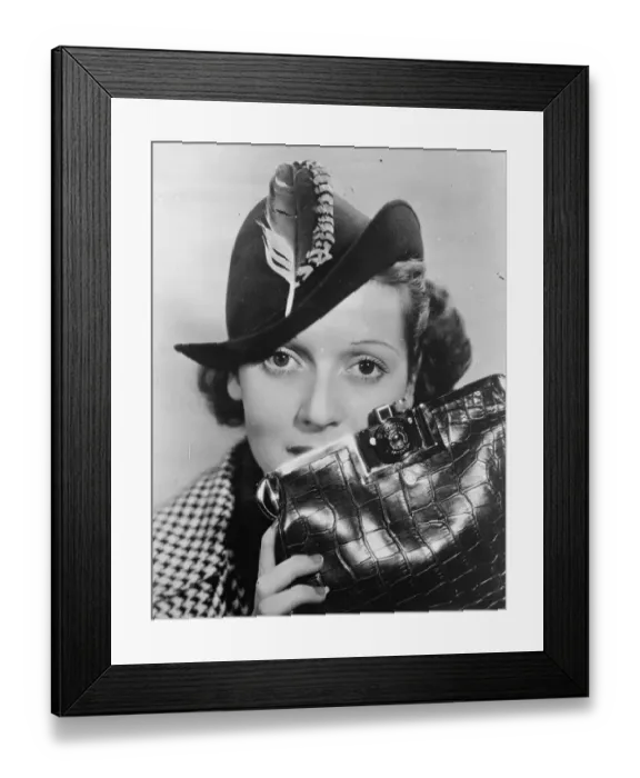 Framed Print : Handbag that sees all. Flap conceals a camera. The keen woman amateur photographer Framed Print : Handbag that sees all. Flap conceals a camera. The keen woman amateur photographer