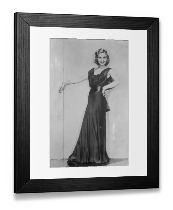 Framed Print : Draped neckline for evening wear. Beautiful Adrrenne Lore wearing a gown of double Framed Print : Draped neckline for evening wear. Beautiful Adrrenne Lore wearing a gown of double