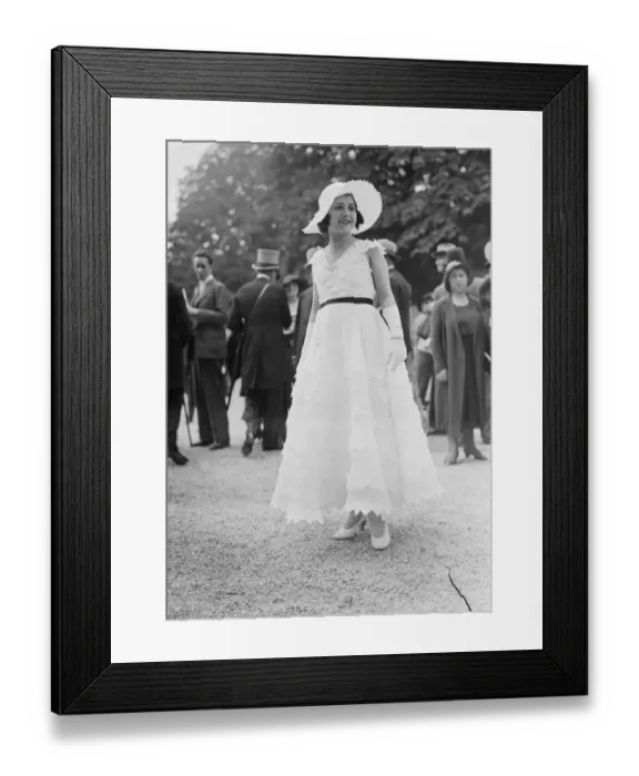 Framed Print : Striking fashions at French Grand Prix meeting at Longchamps. One of the striking Framed Print : Striking fashions at French Grand Prix meeting at Longchamps. One of the striking