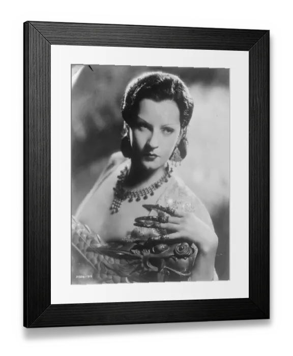 Framed Print : Mandarin finger tips the latest fashion stunt. Juliette Compton, the famous film star Framed Print : Mandarin finger tips the latest fashion stunt. Juliette Compton, the famous film star