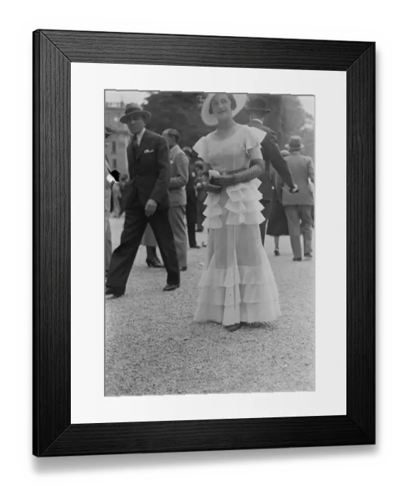 Framed Print : Striking fashions at French Grand Prix meeting at Longchamps. One of the striking Framed Print : Striking fashions at French Grand Prix meeting at Longchamps. One of the striking
