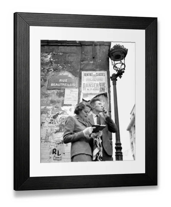 Framed Print : Couple take walk along Seine