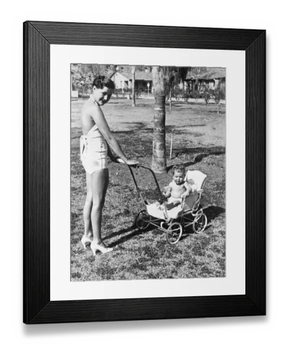 Framed Print : Arlene Judge takes baby for a ride in the Californian sunshine. Mrs Wesley Ruggles