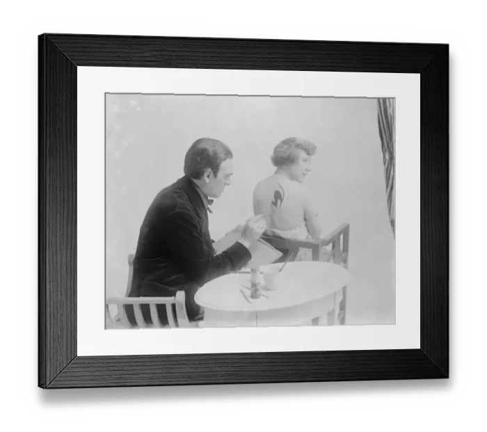 Framed Print : Fashions Latest Craze Miss Mona Vivian has her pet black cat painted on her Framed Print : Fashions Latest Craze Miss Mona Vivian has her pet black cat painted on her