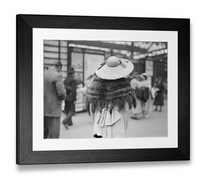 Framed Print : Taking her tails to Ascot. Photo shows: a fur cape with tails and a wide-brimmed Framed Print : Taking her tails to Ascot. Photo shows: a fur cape with tails and a wide-brimmed