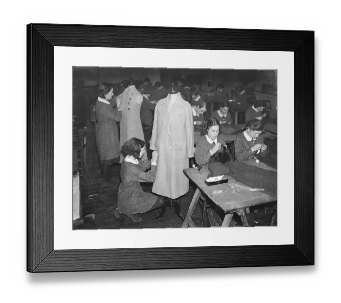 Framed Print : Schoolgirl dressmakers prepare for their own exhibition. Youthful dressmakers, milliners