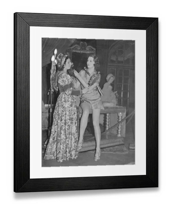 Framed Print : Future beauty lends a hand to the past. Well-known women, in costume, are appearing Framed Print : Future beauty lends a hand to the past. Well-known women, in costume, are appearing