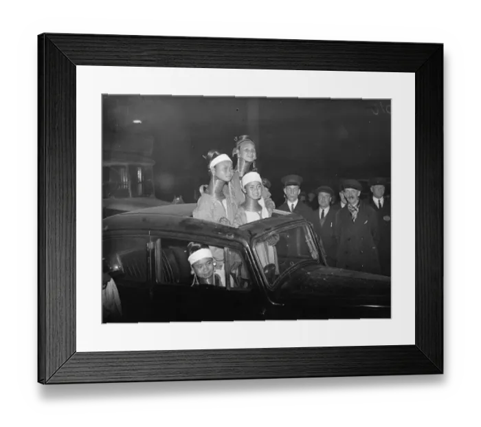 Framed Print : They found the sunshine roof invaluable. Giraffe necked women arrive in London