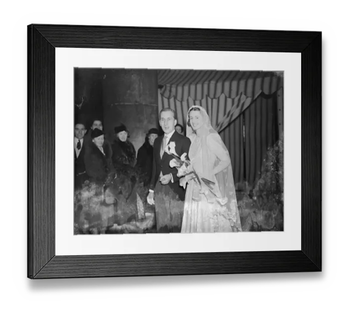 Framed Print : Daughter of famous conductor married at St Georges, Hanover Square. Medieval wedding gown Framed Print : Daughter of famous conductor married at St Georges, Hanover Square. Medieval wedding gown