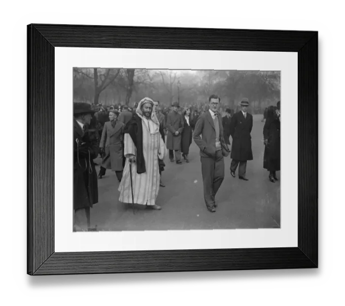 Framed Print : East meets West in the park. Abdesalam B L Bennuna of Tetuanu, Morrocco, wearing Framed Print : East meets West in the park. Abdesalam B L Bennuna of Tetuanu, Morrocco, wearing