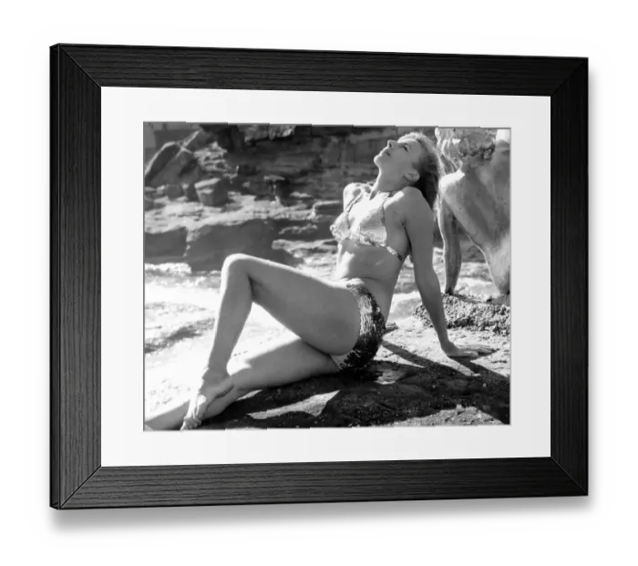 Framed Print : A young woman in a sequin bikini sunbathing June 1967 Framed Print : A young woman in a sequin bikini sunbathing June 1967