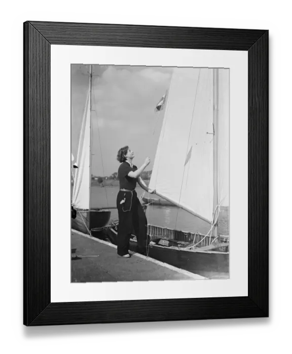 Framed Print : Hoisting the flag!. Yachting girl, Miss Peggy Masters, wasting the burgee (pennant Framed Print : Hoisting the flag!. Yachting girl, Miss Peggy Masters, wasting the burgee (pennant