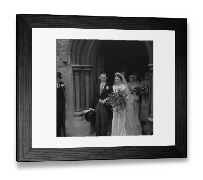 Framed Print : An old fashion wedding at Eltham Parish church. The bride and groom leaving the church