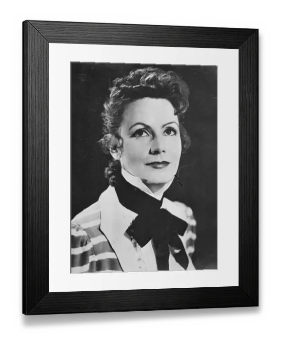 Framed Print : Greta Garbos new hairstyle, in which curls have taken the place of the almost severe